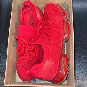 Red women’s athletic shoes